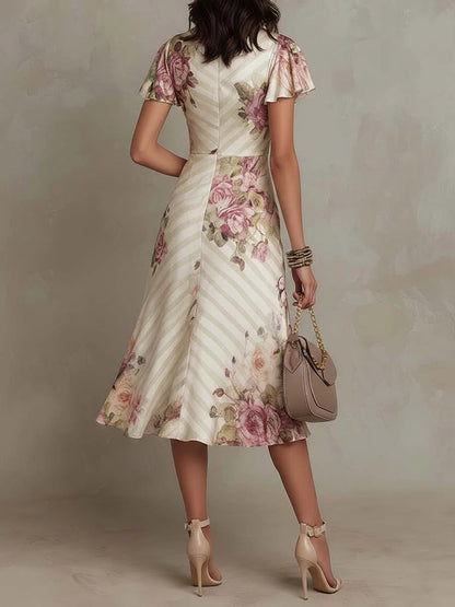 Margaret | Satynowa sukienka midi w kwiaty w stylu vintage